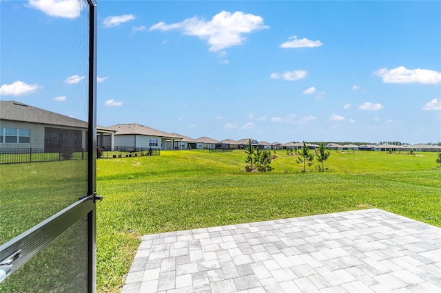 6046 SW 86th Cir, Ocala, FL 34481 - view of grassy yard with a residential view and a patio