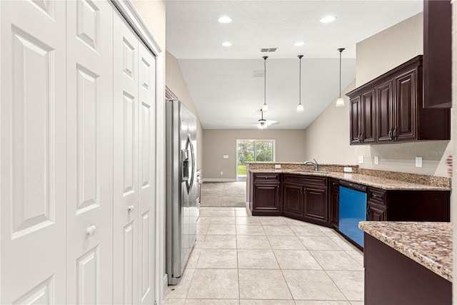 10313 SW 45th Ave, Ocala, FL 34476 - kitchen with dishwasher, stainless steel refrigerator with ice dispenser, lofted ceiling, a peninsula, and a sink