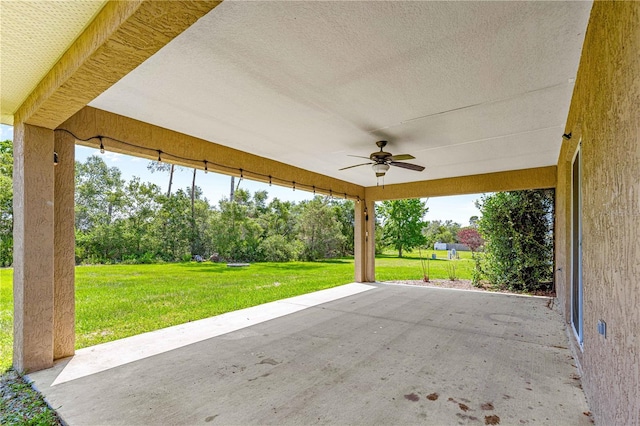 10313 SW 45th Ave, Ocala, FL 34476 - view of patio / terrace featuring a ceiling fan and view of scattered trees