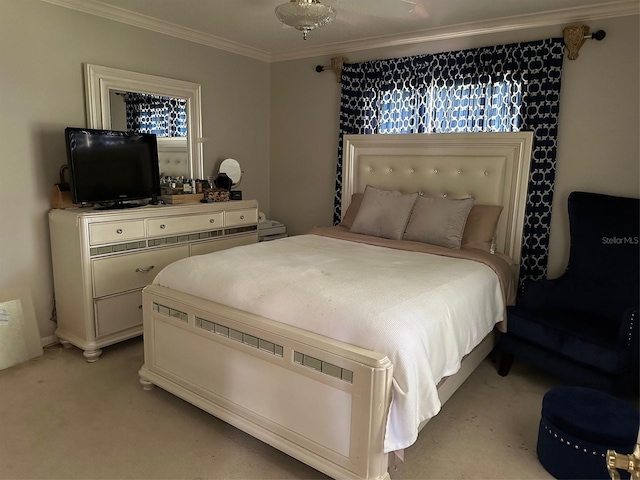 bedroom with ornamental molding and light colored carpet