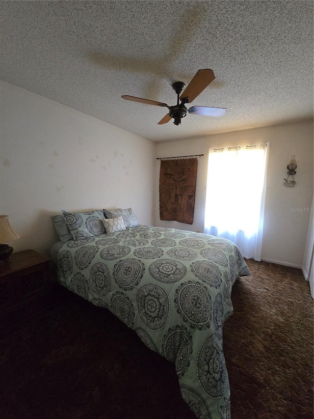 bedroom featuring carpet floors and ceiling fan