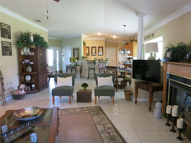 1799 W Shanelle Path, Lecanto, FL 34461 - living area with light tile patterned flooring, ornamental molding, ornate columns, lofted ceiling, and baseboards