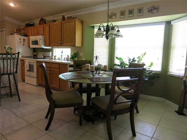 1799 W Shanelle Path, Lecanto, FL 34461 - dining space with crown molding, light tile patterned floors, a chandelier, and healthy amount of natural light
