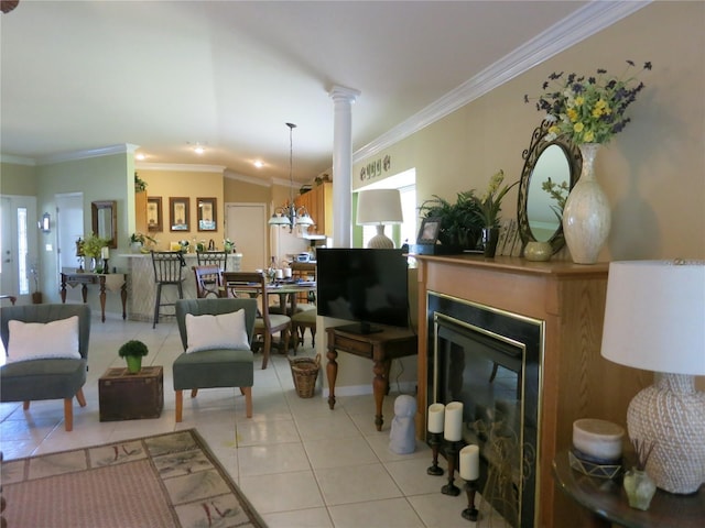 1799 W Shanelle Path, Lecanto, FL 34461 - living area featuring light tile patterned floors, ornamental molding, ornate columns, vaulted ceiling, and a glass covered fireplace