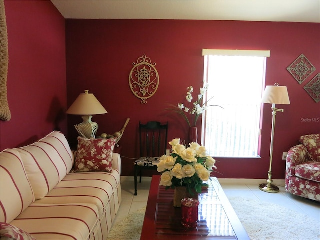 1799 W Shanelle Path, Lecanto, FL 34461 - tiled living room featuring baseboards and an accent wall