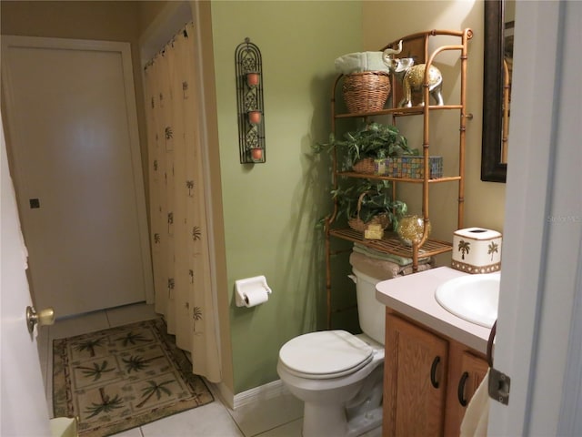 1799 W Shanelle Path, Lecanto, FL 34461 - bathroom with tile patterned flooring, toilet, vanity, baseboards, and a shower with shower curtain
