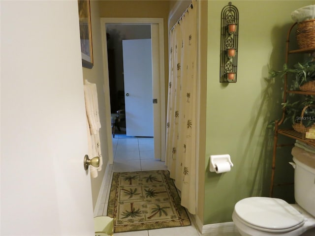 1799 W Shanelle Path, Lecanto, FL 34461 - bathroom with tile patterned floors, toilet, and baseboards