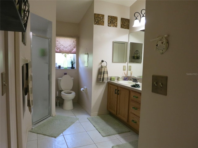 1799 W Shanelle Path, Lecanto, FL 34461 - bathroom featuring a shower stall, tile patterned floors, toilet, and vanity