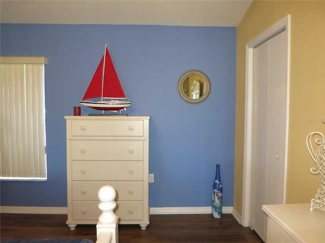 1799 W Shanelle Path, Lecanto, FL 34461 - bedroom with dark wood-style flooring and baseboards