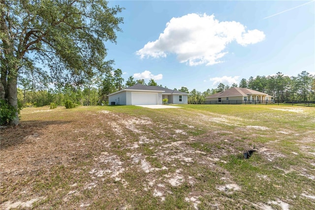 13561 SW 85th Pl, Dunnellon, FL 34432 - view of yard with a garage