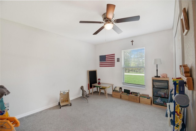 13561 SW 85th Pl, Dunnellon, FL 34432 - living area with carpet, a ceiling fan, and baseboards