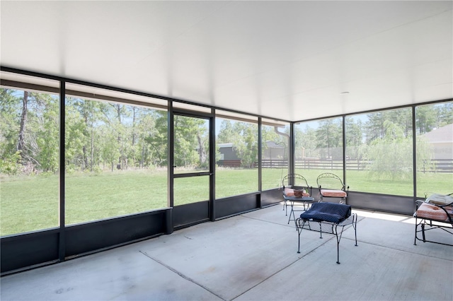 13561 SW 85th Pl, Dunnellon, FL 34432 - sunroom featuring view of wooded area