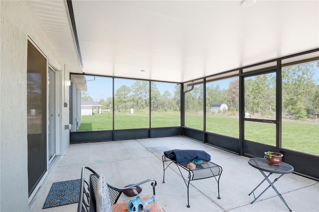 13561 SW 85th Pl, Dunnellon, FL 34432 - unfurnished sunroom with plenty of natural light