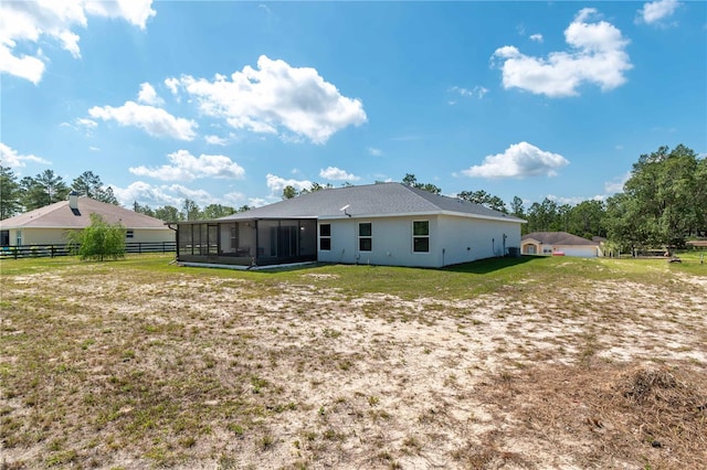 13561 SW 85th Pl, Dunnellon, FL 34432 - rear view of house with a sunroom