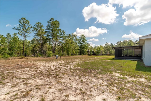 13561 SW 85th Pl, Dunnellon, FL 34432 - view of yard featuring a sunroom