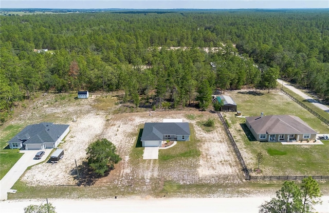 13561 SW 85th Pl, Dunnellon, FL 34432 - view of subject property with a heavily wooded area
