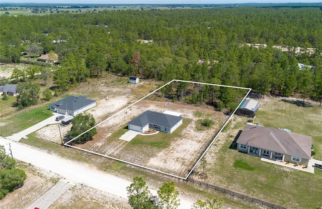 13561 SW 85th Pl, Dunnellon, FL 34432 - aerial view of property's location with a heavily wooded area and property boundaries highlighted