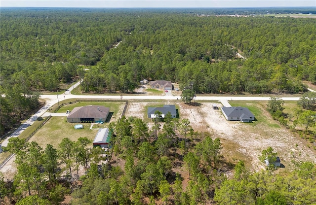 13561 SW 85th Pl, Dunnellon, FL 34432 - drone / aerial view of a heavily wooded area