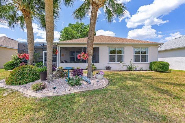 9663 SW 92nd Place Rd, Ocala, FL 34481 - ranch-style house with a front lawn, stucco siding, and a sunroom