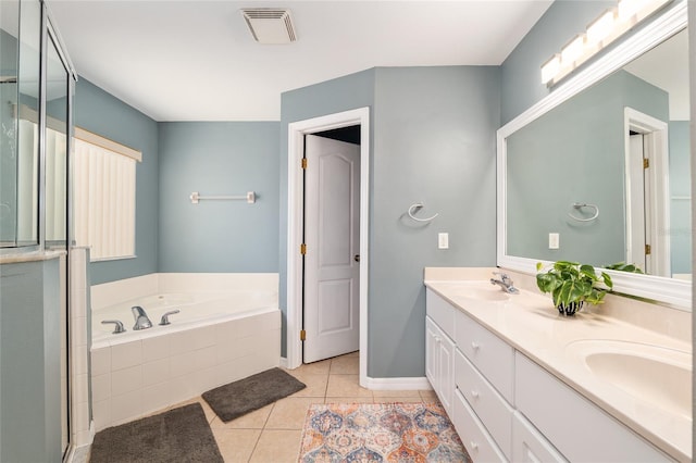 8053 SW 62nd Ave, Ocala, FL 34476 - full bathroom featuring tile patterned floors, a bath, double vanity, and an enclosed shower