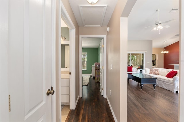 8053 SW 62nd Ave, Ocala, FL 34476 - hallway featuring dark wood-type flooring, plenty of natural light, and baseboards