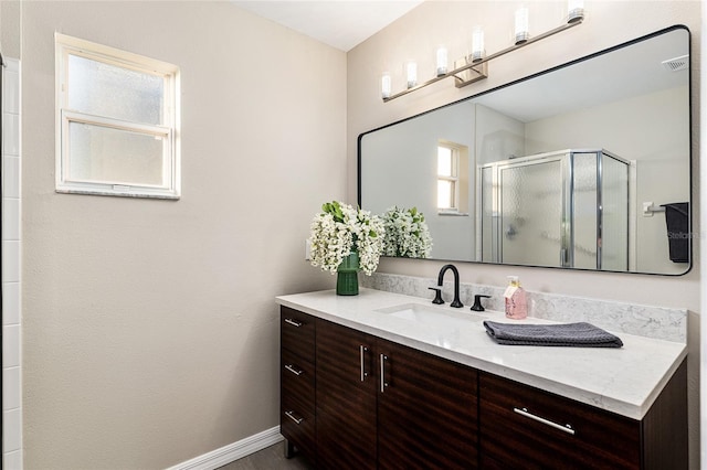 9729 SW 97th St, Ocala, FL 34481 - full bath featuring a shower stall, vanity, and baseboards