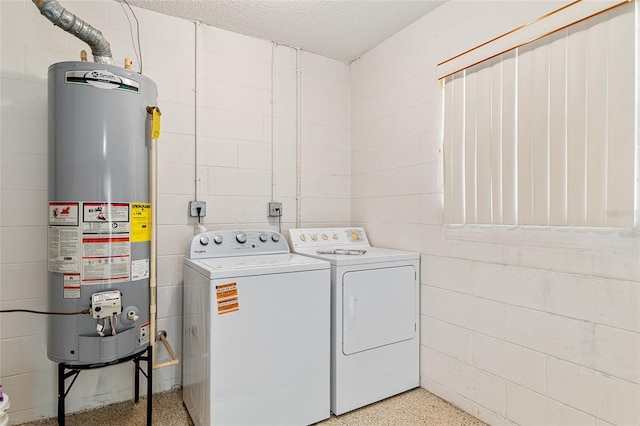 9729 SW 97th St, Ocala, FL 34481 - laundry room with water heater, washer and dryer, concrete block wall, and a textured ceiling