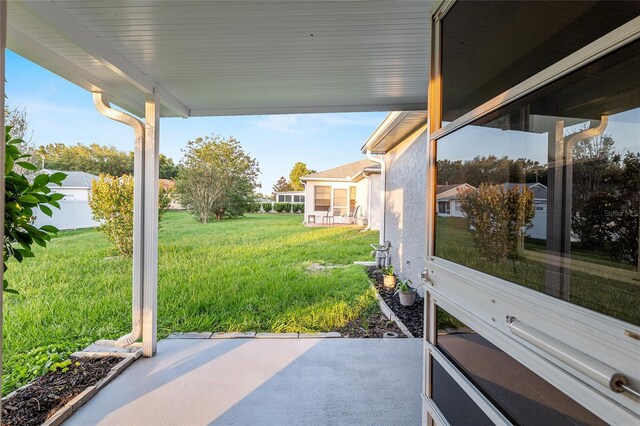 9729 SW 97th St, Ocala, FL 34481 - view of green lawn featuring a patio area