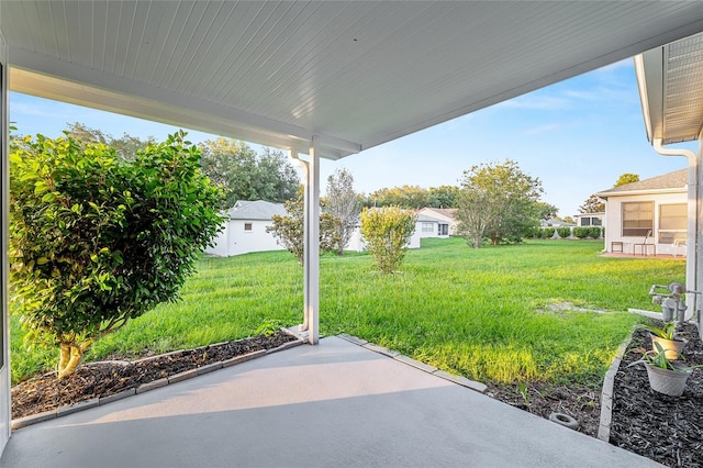 9729 SW 97th St, Ocala, FL 34481 - view of green lawn featuring a patio area