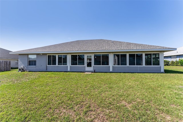 5920 SW 88th Pl, Ocala, FL 34476 - rear view of property featuring a lawn and roof with shingles