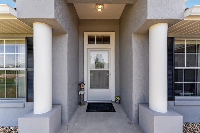 5920 SW 88th Pl, Ocala, FL 34476 - view of exterior entry with stucco siding