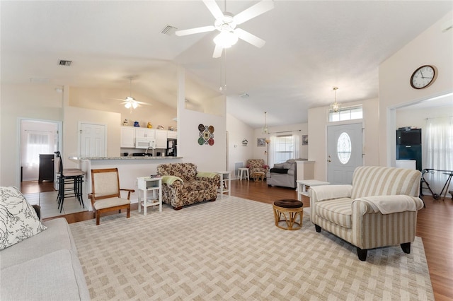 5920 SW 88th Pl, Ocala, FL 34476 - living room with ceiling fan, lofted ceiling, and light wood-style flooring