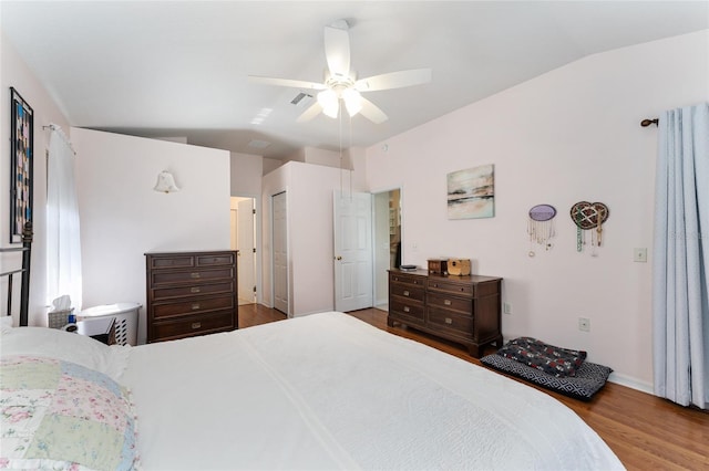 5920 SW 88th Pl, Ocala, FL 34476 - bedroom with wood finished floors, lofted ceiling, ceiling fan, and baseboards