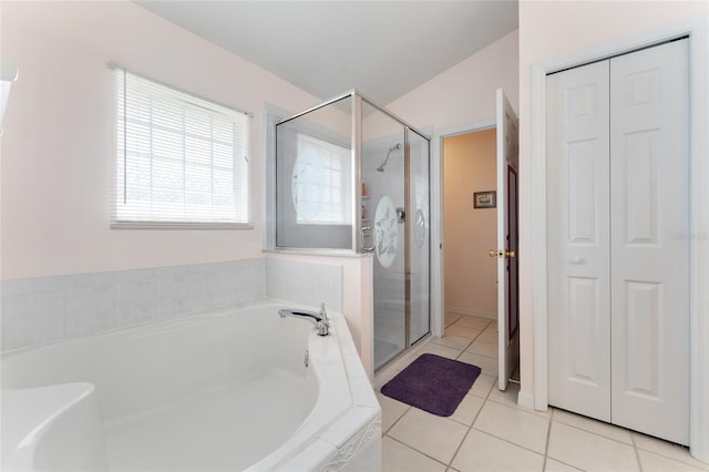 5920 SW 88th Pl, Ocala, FL 34476 - bathroom with a closet, a stall shower, and a garden tub