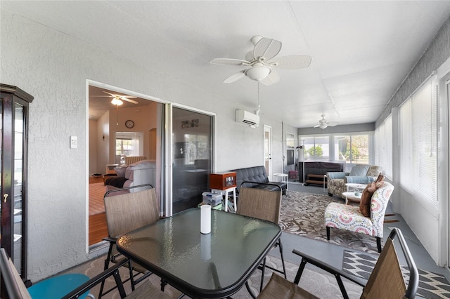 5920 SW 88th Pl, Ocala, FL 34476 - sunroom / solarium featuring a hot tub, ceiling fan, a textured wall, a wall mounted air conditioner, and outdoor dining area