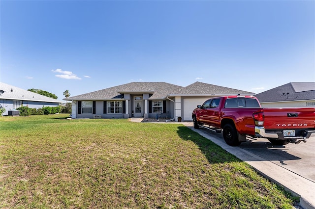 5920 SW 88th Pl, Ocala, FL 34476 - ranch-style home with a garage, a front yard, central AC, stucco siding, and driveway