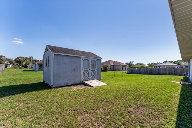 5920 SW 88th Pl, Ocala, FL 34476 - view of yard with a storage unit and an outdoor structure