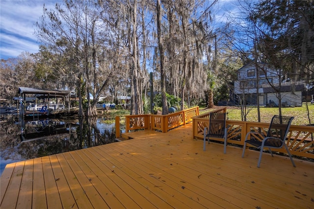 6620 S Merleing Loop, Floral City, FL 34436 - wooden terrace featuring a boat dock, a water view, and boat lift