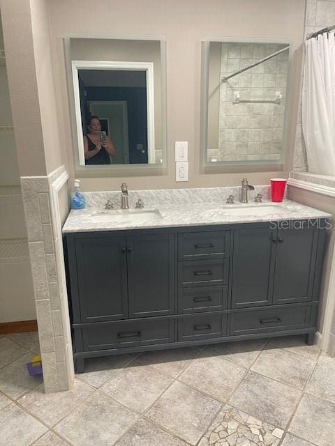 6051 NE 25th Ave, Ocala, FL 34479 - full bathroom with double vanity and curtained shower