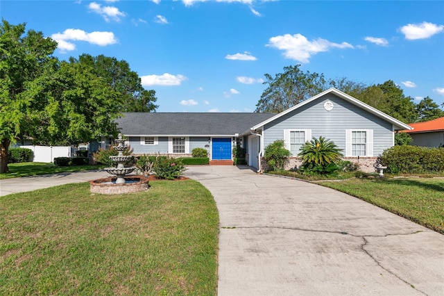 1404 SE 40th Ct, Ocala, FL 34471 - ranch-style house with brick siding and concrete driveway