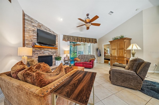 2948 W Henley Ln, Dunnellon, FL 34433 - living area featuring ceiling fan, a stone fireplace, high vaulted ceiling, and light tile patterned floors