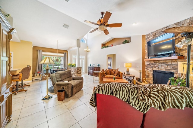 2948 W Henley Ln, Dunnellon, FL 34433 - living area with ceiling fan, lofted ceiling, light tile patterned flooring, and a stone fireplace