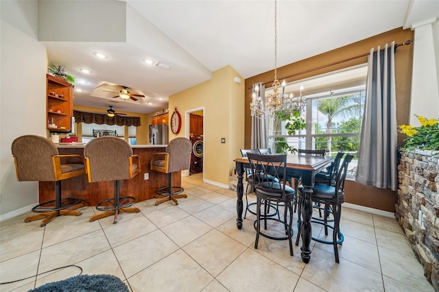 2948 W Henley Ln, Dunnellon, FL 34433 - dining space featuring baseboards, a ceiling fan, light tile patterned floors, and lofted ceiling