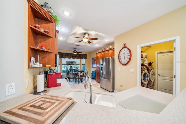 2948 W Henley Ln, Dunnellon, FL 34433 - kitchen with stainless steel refrigerator with ice dispenser, a sink, recessed lighting, light countertops, and washing machine and dryer
