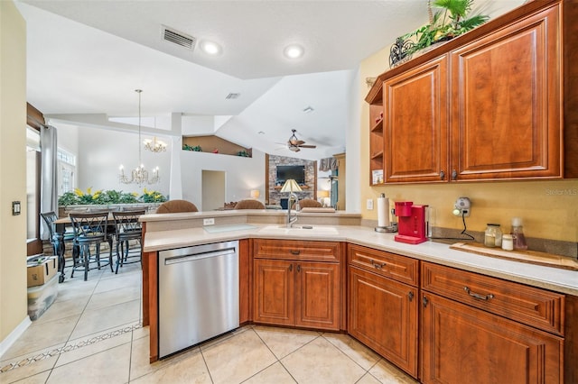 2948 W Henley Ln, Dunnellon, FL 34433 - kitchen with dishwasher, a sink, ceiling fan, light countertops, and vaulted ceiling