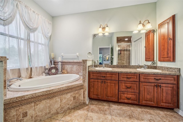 2948 W Henley Ln, Dunnellon, FL 34433 - bathroom featuring a garden tub, a stall shower, and double vanity