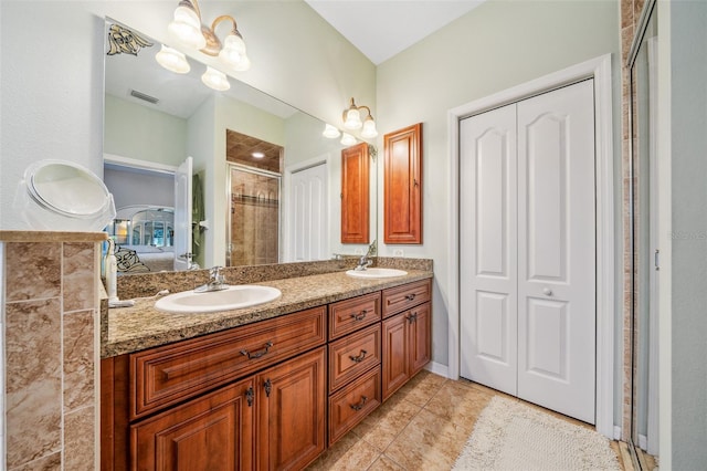 2948 W Henley Ln, Dunnellon, FL 34433 - ensuite bathroom with a shower stall, double vanity, and tile patterned floors