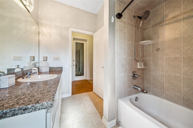 2948 W Henley Ln, Dunnellon, FL 34433 - bathroom with tub / shower combination, tile patterned flooring, vanity, and baseboards