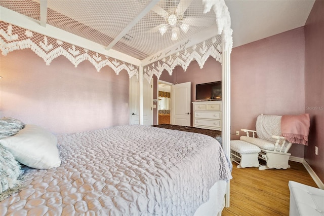 2948 W Henley Ln, Dunnellon, FL 34433 - bedroom with wood finished floors and baseboards