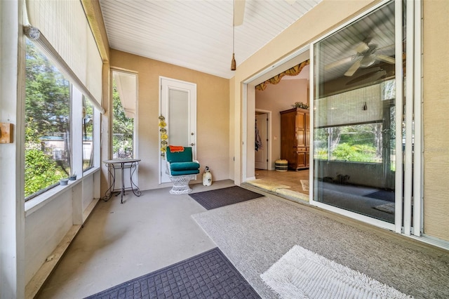 2948 W Henley Ln, Dunnellon, FL 34433 - sunroom with a ceiling fan and plenty of natural light